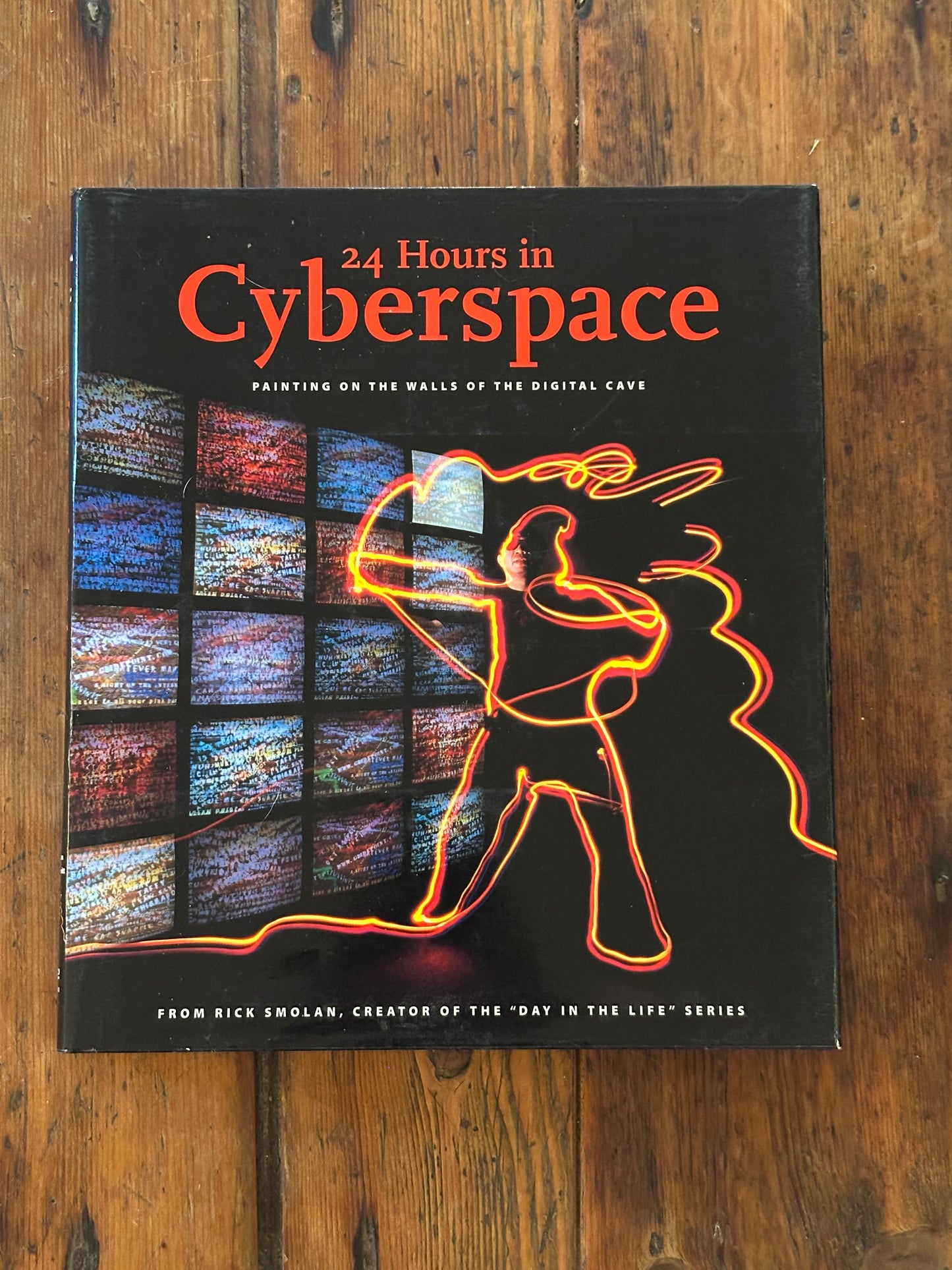 Tripp's Store / BOOKS / 24 Hours in Cyberspace" painting on the walls of the digital cave.
