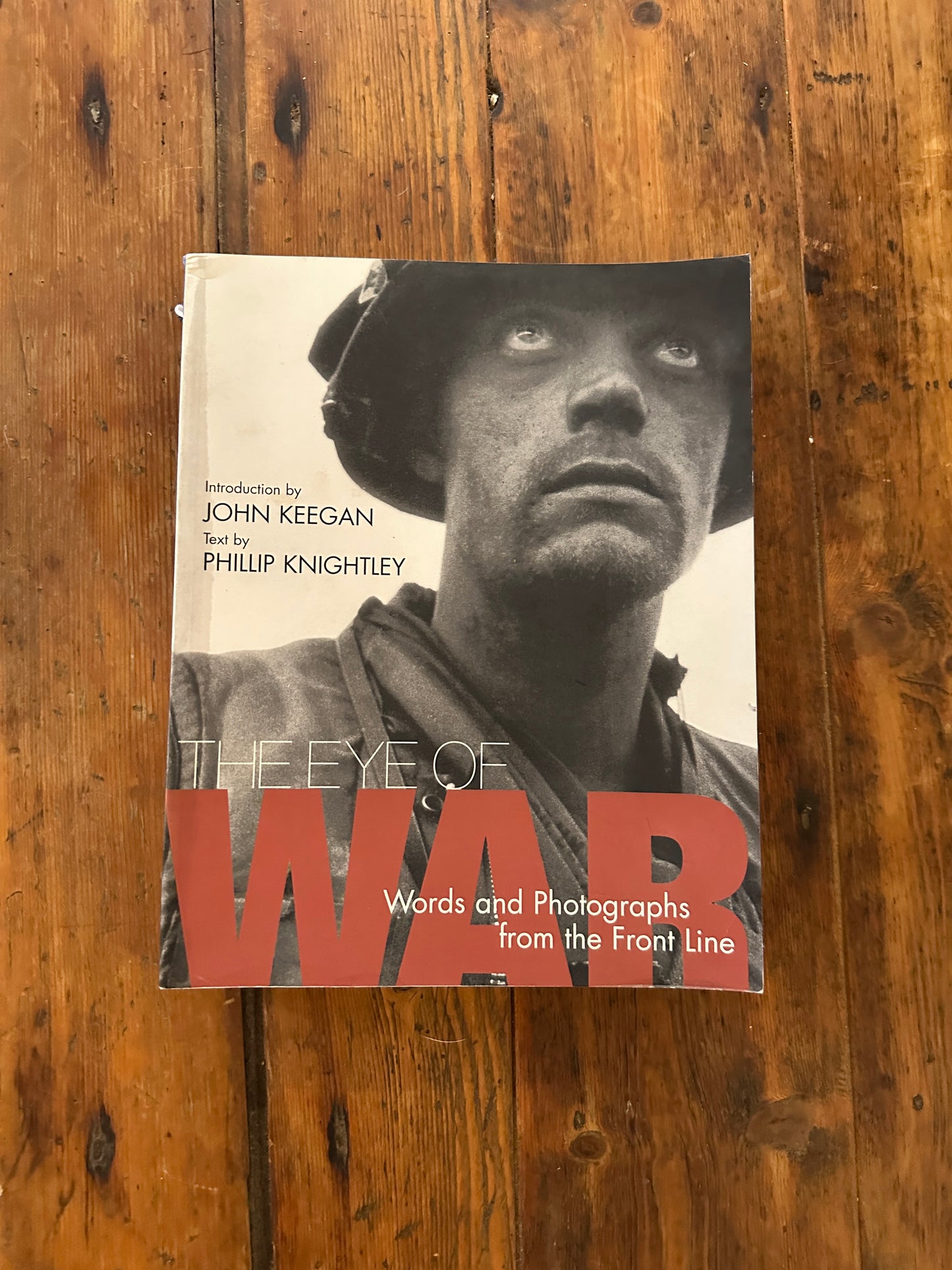 Tripp's Store / BOOKS / The Eye of War, Words and Photographs from the Front Line, by Phillip Knightley