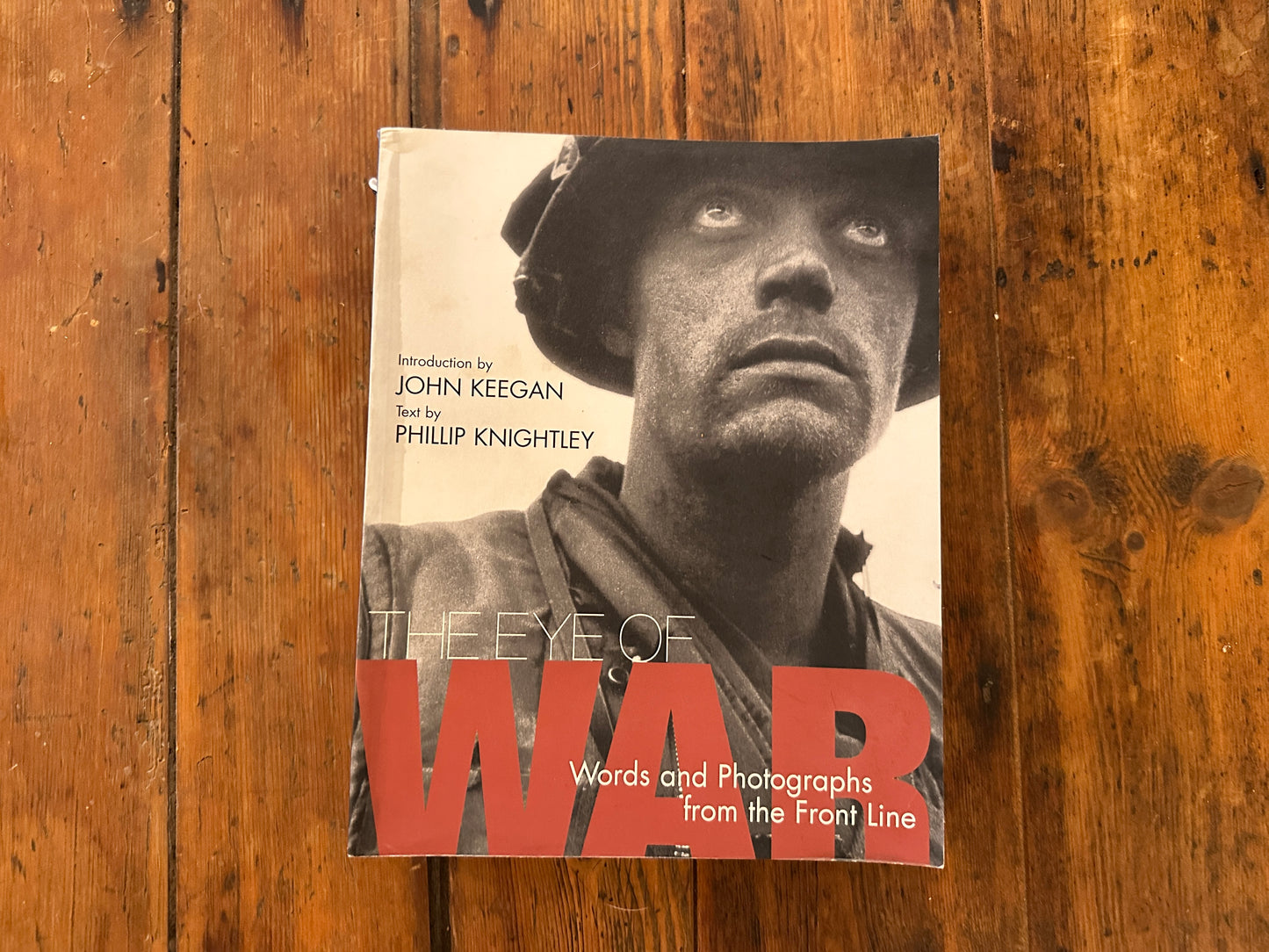 Tripp's Store / BOOKS / The Eye of War, Words and Photographs from the Front Line, by Phillip Knightley