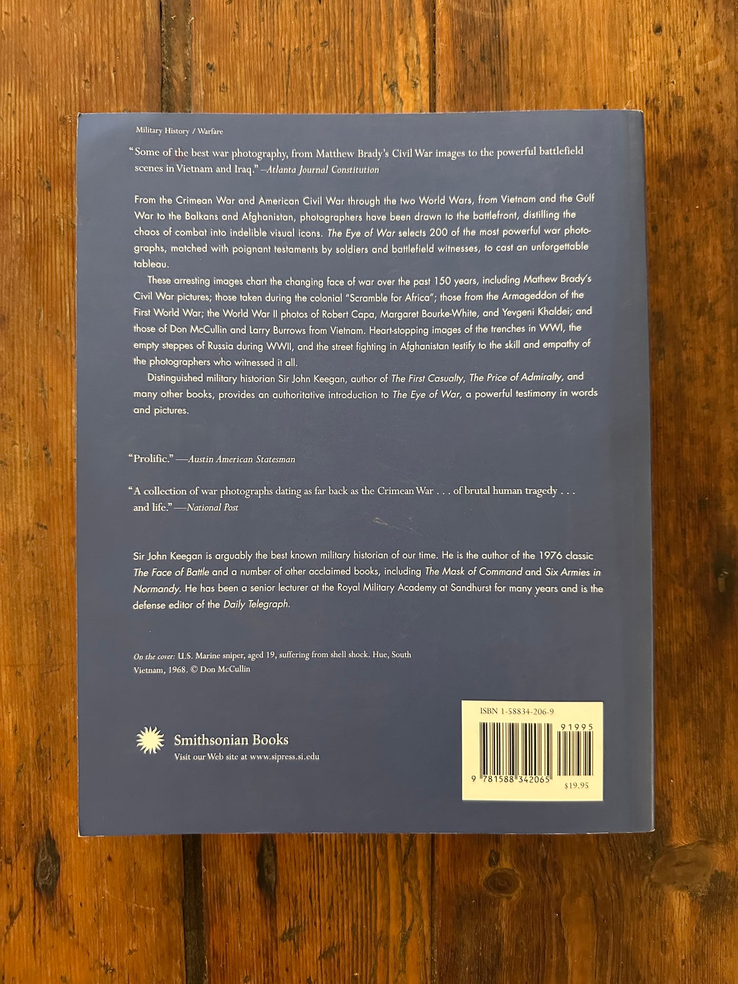 Tripp's Store / BOOKS / The Eye of War, Words and Photographs from the Front Line, by Phillip Knightley