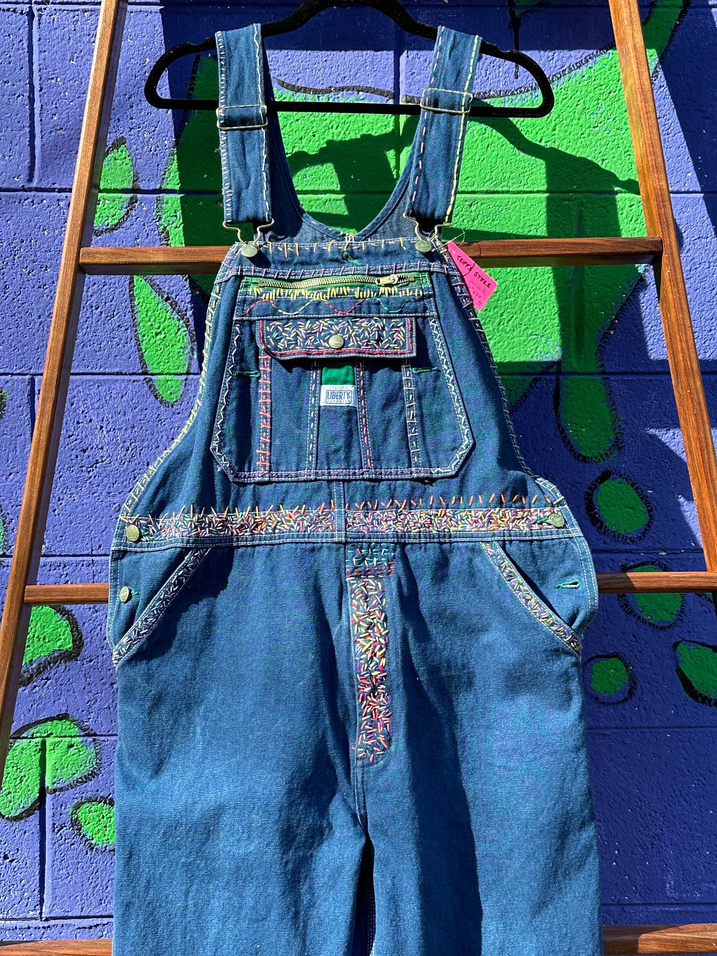Tripp's Store : Bespoke denim bib overalls // Boho embroidered // 40" X 27" // Colorful one of kind overalls