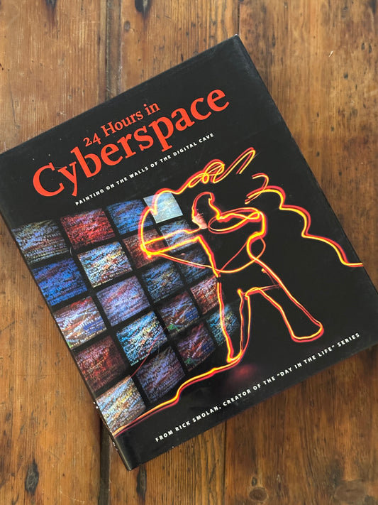 Tripp's Store / BOOKS / 24 Hours in Cyberspace" painting on the walls of the digital cave.
